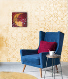 small feminine painting hanging on the wall above a blue chair