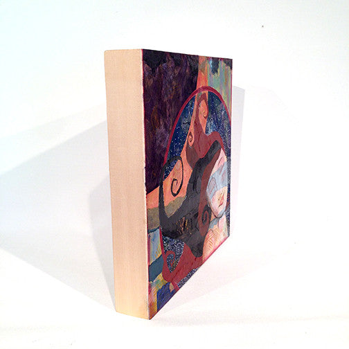 side view of a small feminine artwork