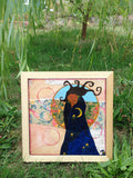 black goddess painting under a tree by Lea K. Tawd