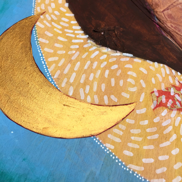 gold crescent moon painting detail on a mixed media artwork